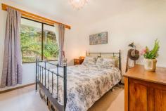 37 Carrington Avenue Mount Victoria NSW 2786 $660,000 - $690,000 Positioned in a quiet cul-de-sac in the quaint village of Mt Victoria is this much loved home. It offers a quiet haven, surrounded by easy care gardens, wonderful birdlife and a natural outlook over the surrounding bushland. This is a perfect opportunity for an affordable tree change at the top of the Blue Mountains. Features Include: • 2 bedrooms and and 3rd bedroom or work from home office space • Open plan living room offering privacy, space and lots of natural light • Functional kitchen with electric cooking • Expansive balcony overlooking the natural environment • Stunning aspects from every window in the house • Hebel brick in construction - thermally efficient • Classic Jotul European wood burning oven/heater and natural gas heating • Updated bathroom and internal laundry • Northerly aspect embracing the flow of indoor/outdoor living • Low maintenance block of approximately 1824 m2 all the way to Fairy Dell Creek • Short walk to the village, parks, local restaurants and Mt Vic Flicks • Mt Victoria is on a direct train line to Sydney
