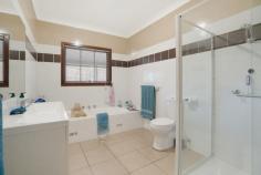 584 Wollombi Rd Bellbird NSW 2325 $590,000 - $610,000 – Stylish single level brick home in popular Bellbird location – Beautiful character features throughout such as bullnose wrap around verandah, bay windows, plaster ceiling roses, timber flooring, French doors and ornate archways – Three good sized bedrooms, two with built in robes, all with French door access to the verandah – Large timber kitchen, with scope to add your own touches – Good sized family room with A/C opening to the formal dining space with combustion fire and polished timber flooring – Family bathroom with separate shower and large bath perfect to soak in after a tough day – Second bathroom with shower only off the laundry – Easy to maintain yard with side access to the rear yard. – Double garage that opens to Doyle Street