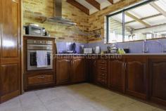 20 Heenan Street Nulsen WA 6450 This well-designed 3-bedroom, 1- bathroom brick home exudes that ‘homely feel’ with its high cathedral ceilings and exposed wooden beams. The open plan living, dining and kitchen area creates a sense of spaciousness, with beautiful jarrah cupboards in the large kitchen with plenty of bench space. Good size bedrooms all have built-in-robes with wooden blinds and the bathroom comes with that big bath to soak and unwind after a big day! An enclosed patio with stained decking and tile fire, provides an outdoor extension of the living space for entertaining. 8m x 6 m brick and colourbond powered workshop with single roller door and personal door for access. – Rheem Electric HWS – Reverse cycle air-conditioning – Tile fire in enclosed patio – Established gardens front and rear – Side Access 260m to Pink Lake IGA 850m to ESHS 500m to Nulsen Primary