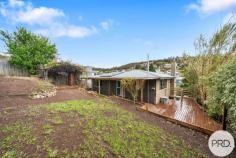 24 Bilinga Street Mornington TAS 7018 $490,000 - $550,000 Located only a few minutes' drive from Eastlands Shopping Centre, or just an easy walk away, this brick home is brimming with potential. You can enjoy it as it is or, with a little TLC, renovate and reap the rewards. The open-plan living area features floorboards and large windows that invite natural light and offer distant mountain views. With three bedrooms and an upgraded bathroom, functionality is added to the home. Downstairs, a versatile storage area awaits your creative touch, whether that be a man cave, rumpus room, or office (subject to council approval). The outdoor deck and terraced backyard provide space for family barbecues and enjoyment. Established trees, including cherry, pear, and apple trees in the front yard, offer privacy. Off-street parking for two cars adds convenience. Whether you're a first-time homebuyer or a tradesperson looking for a project, this property is a great opportunity for the astute buyer.