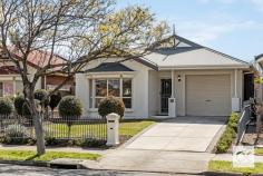 5A Grallina Street Lockleys SA 5032 $799,000 Positioned on a spacious 424sqm allotment, this charming 3-bedroom, 2-bathroom home is a true gem that combines modern comfort with the beauty of outdoor living. Nestled in the heart of one Adelaide’s most sought-after suburbs, this superb location offers convenience. With easy access to the city and the beach, a stroll to Linear Park, nearby schools, and local shops, living here effortlessly caters to a wide range of lifestyles. With its unbeatable location and recent updates, it’s a place where dreams become a reality. Don’t miss the opportunity to make this beautifully updated and well-maintained home your own. What we love: • Recently updated modern kitchen with an island bench and stunning 40mm stone benchtops, this kitchen is a chef’s dream. • Quality European appliances with a Miele induction cooktop, oven (with gas connection if needed), and Asko dishwasher, all adding to the kitchen’s allure. • Large walk-in pantry offering ample storage space and power for your appliances, keeping your kitchen organised and efficient. • Open plan living overlooking the rear garden, creating a seamless connection to the lounge room with easy access to the undercover entertaining area. • 2.7m ceilings add a sense of spaciousness and elegance throughout the • Oversized master bedroom, featuring an ensuite and walk-in robe, complete with a charming bay window overlooking the front garden. • Bedrooms two and three come with built-in robes. • Family bathroom with a separate WC • The entire home has been freshly painted, creating a clean and inviting atmosphere that’s ready for you to move right in. • Expansive all-weather entertaining area perfect for gatherings and relaxation. • A spacious back yard with lush lawn and garden beds that is the perfect space for children to play freely and for your furry friends to roam. • Ducted reverse cycle air conditioning, zoned for all living areas and bedrooms • Ceiling fans for added comfort in living and bedrooms. • Two garden sheds providing additional storage for your outdoor equipment. • Security system for your peace of mind. • Walking distance to Linear Park, ideal for outdoor enthusiasts. • Easy Access to Adelaide Airport making travel a breeze. • Proximity to the City, Beach, and Local Shops, perfect for all lifestyles.
