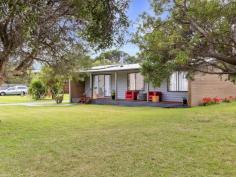 1 Harbour View Sandy Point VIC 3959 $785,000 Set on a corner block of approx. 659m2 with flat open parking for multiple cars / vans and easy access for boats, this brilliantly maintained property is ready to enjoy. Front verandah for sitting back and watching the world go by. Open plan living room with wood heater and RC/AC, opening to a sheltered rear decked entertaining area. Modern kitchen with timber cabinetry, stainless appliances and breakfast bar to meals area. 3 fitted bedrooms, central modern family bathroom with separate w.c. and laundry / utility room. Two lock up storage sheds, bore water and tank for drinking. Minimal running costs with solar power (and mains). Only 2 minutes walk to beach access and 6 to the shop, cafe, community hall and tennis courts. Perfect fuss-free escape where you can enjoy the pristine coastline and the great outdoors.