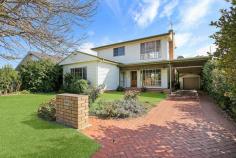 4 Hunt Street Wodonga VIC 3690 $599,000 Located in the heart of Wodonga, tucked away in a quiet court and walking distance to Wodonga's CBD, popular cafes, Wodonga Plaza and Schools, this central home has everything. This unique double storey home boasts strong street presence, with plenty of features throughout with room to move. Downstairs is a true delight and consists of a large lounge with gas console heating, timber mantle and additional dining with north facing windows. The functional Blackwood kitchen is in the centre of the home and provides great storage and bench space. The master bedroom with walk in robe is at the front of the house and the bathroom nearby with separate toilet off the laundry. Upstairs offers a large lounge with its own balcony and great views, built in shelving and a large bedroom with own bathroom. Set on a large 763m2 allotment and offering attractive low maintenance surrounds, spacious back lawn area, tandem double carport and lockup garage. A true delight to offer for sale