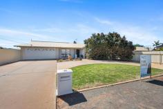 32 Turich Way VICTORY HEIGHTS WA 6432 $649,000 A opportunity now exists to own a large parcel of land stretching over 2000m2. Including a beautiful family home, established lawn, massive entertaining area, and a blank canvas to create your own personalised lifestyle. Step inside and appreciate the well maintained home, with 4 bedrooms, including a walk in robe and ensuite to the master bedroom and built in robes to all remaining rooms. There is a separate formal lounge at the front of the home, but, the wow factor is the open plan living, dining and kitchen – with high ceilings and exposed beams, allowing lots of natural light. The well appointed kitchen has lots of storage in modern neutral tones, with rangehood and electric cooking. Entertaining is made easy, with the huge pitched patio, complete with a built in bar, BBQ and pizza oven. Or take some time out and enjoy a cuppa in the gazebo surrounded by established lawn and garden beds. Storage is sorted, with two powered sheds, plus two garden sheds, a rain water tank and crops of home grown vegetables to enjoy for months. Or utilise a blank canvas for what ever your needs may be. So many features, make an appointment to view, call Martina 0417 180 103. • Brick and Iron Home • 2008m2 Block Size • 4 Bedrooms • 2 Bathrooms • 2 Living Areas • Open Plan Living/Dining • Well Appointed Kitchen • Electric Cooking • High Ceiling with Exposed Beams • Solar Panels • Gas HWS • Gas Heating • Natural Gas • Huge Entertaining Pitched Patio • Built in Bar/Pizza Oven/BBQ • Double Garage • Council Rates $2,568.64 p/a
