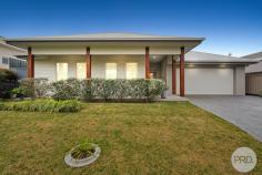16 Wulung Street Corlette NSW 2315 Situated in the highly sought after 'Vantage Estate', this single level, north facing home effortlessly blends modern aesthetics with convenient living and is sure to tick all the boxes! Beautifully landscaped grounds and gardens frame the fresh & clean façade and set the tone for the contemporary elegance that awaits inside. You will be captivated by the seamless and expansive, open-plan layout in the heart of the home, which makes entertaining your family & friends in a central hub a dream! Find yourself creating culinary delights for your guests in the impressive kitchen which boasts a stone island bench, quality appliances and plenty of cupboard space. For those seeking relaxation, the undercover entertaining area presents the perfect setting for hosting friends and family, rain or shine. The backyard features a beautifully maintained lawn surrounded by fully landscaped gardens, providing a serene escape for both play and entertainment - If you're looking for a touch of luxury, a spa adds a touch of indulgence to your outdoor retreat. This home boasts not one, but three distinct living areas including a luxurious home theatre. The main living area exudes warmth and comfort, while the dedicated theatre room promises the ultimate cinematic experience within the comforts of your very own home. A separate living area, which could easily serve as a teenage retreat, offers versatility and privacy for every member of the family and means that you can comfortably accommodate everyone with ease. The expansive proportions continue into the four bedrooms of accommodation with the enormous main bedroom serving as the perfect private sanctuary. Equipped with air conditioning and timeless plantation shutters, this bedroom is an oasis of comfort. The ensuite is a masterpiece of design and practicality, featuring "his and hers" sinks that add a touch of convenience to your daily routine. The remaining three bedrooms are equally inviting, each boasting air conditioning, ceiling fans, and plantation shutters. A study adds a versatile space to the home, with the option to effortlessly convert it into a fifth bedroom according to your needs. The main bathroom, with its timeless design, offers both a large shower and a relaxing bath, catering to your every preference. This home is a haven of modern living with a touch of luxury and functionality. From the open-plan living spaces to the lush outdoor retreat and double garaging, every detail has been carefully considered. With its impeccable design and prime features, all that's left for you to do is pack your bags and move in - your perfect lifestyle awaits!