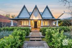 32 Foster Street Parkside SA 5063 $1,600,000 Beautiful proof that the only thing better than a double-fronted C1930 Tudor is the one with a Hamptons-inspired rebirth, this substantial family home is the impeccably presented answer for growing families in search of a timeless, statement-making abode with supreme functionality on a prized south-north parcel holding a zoned pass to Glenunga International High School. Stripped back to those strong bones, its no-expense-spared, two-year transformation pairs the Tudor’s beautifully preserved original features – think polished timber floors, soaring decorative ceilings and leadlight windows – with a starring Hamptons-style kitchen and sleek fully-tiled bathrooms. The result is an invigorating home that’s easy to love and hard to leave on a generous parcel with dual driveways, inch-perfect landscaped gardens, powered shed and a sail-shaded patio itching for summer, all just a short pedal or weekend stroll from the southern parklands and CBD beyond. City-fringe living doesn’t get much better than this. Features we love… – Extensive two-year renovations only recently completed – Flexible floorplan with expansive open-plan living and formal lounge room – Stunning open-plan kitchen with stone benchtops, brushed brass tapware/handles, breakfast bar, integrated fridge/freezer, dishwasher and oversized vintage style Smeg oven – Ducted reverse cycle heating and cooling – Powerful 8KW solar system – Hardwood timber floors and high ceilings throughout – Custom storage throughout – Two stylish bathrooms – Head-turning street presence on a quiet street – Enviably placed on a wide, deep parcel with north-facing rear – Electronic gated entry to both driveways – Off-street parking for multiple cars and drive-through access to rear shed – Beautifully presented landscaped gardens with water-feature to front yard – Zoned for Glenunga International High School and Parkside Primary School – Just a 5-minute drive from the CBD – Walking distance to Foodland Frewville