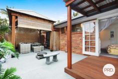 1 / 1A Brookside Road Labrador QLD 4215 $594,000 Great location and perfect easy care renovated single level duplex, to call your own. Insurance only Body Corp. Brand new Kitchen and fully painted throughout with other recent upgrades makes this an easy care place to live in or rent out. Main bedroom has terrace doors opening out to the rear courtyard where you can enjoy privacy and a Bali style hut for entertain or a relaxing afternoon. Features; # Kitchen connection meals prep area with all new appliances. # Main bedroom with fan, double robe, outdoor access and Airconditioner; # Second bedroom with fan and slider access to back courtyard. # Upgraded bathroom, separate toilet. # Two linen cupboards # New paint throughout. # Garage is converted into study or office or possibly gym or 3rd bedroom. # Front covered patio # Bali style hut on back courtyard. # Solar panels at approx 6Kw included. (current power bill is in credit) # Storage shed in back courtyard. # Strata is 'building insurance' only shared with lot next door.