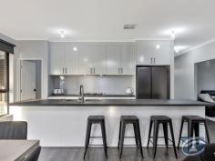 4 Heseltine Circuit Gawler South SA 5118 $699,000 - $729,000 Grant and Bailey Fielke welcome you to 4 Haseltine Circuit, Gawler South. Perched on the top of the hill in the renowned Woodvale Estate in Gawler South, surrounded by great views of Gawler is this premier recently built home. Set back on a large 600sqm allotment, this 2022 built home is perfect for a growing family looking to move into a brand new home, without the need to wait for your land to be ready or your home to be built. Comprising of five well sized rooms, open planed living areas, a study and much more… The Home Features: * A large double door façade leads you into the main hallway of the home. * Master bedroom to the left with his and her walk-in robe into a spacious bathroom with floor to ceiling tiling, double vanity with shower and toilet * A main theatre styled lounge room opposing a fantastic study space. * Open-planned kitchen, meals and living room. The walk-through kitchen with stainless steel appliances has plenty of cupboard and bench space and a walk-in pantry. * A flexible bedroom 5 or utility room comes off this area with build in robe. * The remaining three king sized rooms all include build in robes and carpet finishings. * A large three way main bathroom with floor to ceiling tiles and quality black finishes * Outside the fantastic entertainment area with gas provision, outlooks the fully landscaped rear yard with direct access into large shed. Other features include: * Zoned reverse cycle heating and cooling. * Large solar system * Workshop space in the extended double garage * Curtains to all windows