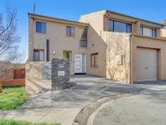 81 Hallen Close Phillip ACT 2606 $800,000 TRI LEVEL separate title townhouse with wonderful panoramic views across the valley towards Black Mountain Tower. Capturing north westerly sun perfect in the Canberra winter with 2 wall mounted air conditioners to keep the place cooler in summer. Polished timber flooring throughout the living area, dining/family and kitchen plus brand new carpeting on staircase and all upstairs bedrooms. Kitchen has stone bench tops lots of cupboard space and lovely views over the rear decking and the mountain ranges. All bedrooms have mirrored sliding doors to the wardrobes and the bathroom has been fully renovated. There is a downstairs bathroom near the front entry next to the laundry. Entry to the property either through the second car spot (easily adaptable to covered space) or through the remote controlled garage door which has internal access. The living room has a built in buffet unit plus a built in wine cabinet. Large timber entertaining deck and astro turf courtyard with gate access to the reserve. This is a lovely place to call home to either singles, partnered up or small families wanting to enjoy townhouse living so close to Canberra Hospital, Swinger Hill shops, Southlands Shopping Centre and Woden Town Square. No lawns to mow either !!