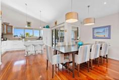 94 Attunga Avenue Kiama Heights NSW 2533 Nestled within Kiama Heights' enchanting coastal landscape, is a custom-designed home to embrace its stunning location. This timeless gem, promises a life enriched by remarkable features and an exceptional setting. If you're seeking a coastal retreat that seamlessly blends custom design, breathtaking views, and spacious living with several outdoor entertainment areas, a double "drive-through" garage designed for caravan or boat storage, an external shower, and a gas point for BBQ on the front balcony, then this stunning five bedroom family home beckons you to embrace a life of sunrises and coastal serenity. Further highlights accentuating this property's offerings are: • The home graces you with sweeping north-facing of Kiama's charming township and iconic lighthouse, with vistas to the south of the rolling green hills and ocean. These breathtaking vistas serve as your daily backdrop, an ever-present reminder of your coastal paradise. • With five generously sized bedrooms, caters perfectly to larger families or those who crave extra space for guests, home offices, or creative pursuits. • For beach lovers, the convenience is unparalleled. Easts Beach is just a leisurely stroll away, granting you access to sandy shores and tranquil waves for endless relaxation and outdoor enjoyment. • The home boasts two distinct living areas, offering ample room for both relaxation and entertainment. Whether you seek cosy family nights or lively social gatherings, this home effortlessly adapts to your needs. • The kitchen is a centerpiece of the home flowing out to the one of the three outside entertaining spaces appointed with all the modern appliances you need for culinary creativity. • Embrace the outdoors on three inviting alfresco areas, each providing a unique perspective of the surrounding beauty and serving as perfect spots to unwind. • Enjoy the convenience of an oversized double garage with drive-through access, ideal for caravan or boat storage. • The front balcony is equipped with a gas point for effortless BBQ grilling and outdoor dining and there is an external shower for refreshing post-beach rinses. • Located in the tranquil enclave of Kiama Heights, with easy access to the stunning Kiama coastal walking track and Kiama township just a short 4km drive away, this setting encapsulates the coastal and country lifestyle you have been dreaming of. If visions of sun-kissed mornings, panoramic coastal vistas, and bespoke architectural design resonate with you, then this stunning five bedroom abode awaits your discovery.