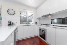 Unit 1/2 Deeley St Maylands WA 6051 Set in one of Mayland’s most enviable locations, just 150m from Bardon Park and it’s riverside parklands this superbly renovated street front townhouse oozes style, comfort and convenience. From the waterfall stone benches in the kitchen, quality Fisher & Paykel stainless steel appliances, the huge insulated pitched roof rear patio, the stunning solid Jarrah floors, the extra height carport and the extra storage, this beautiful home offers the very best of convenient inner city riverside lifestyle. You can just picture yourself making the most of everything this location has to offer with evening riverside walks and rides through serene parkland, being able to walk to Optus Stadium for concerts and walk to the highly renowned Maylands café and bar strip to have dinner and drinks with friends. Everything is at your fingertips! The master bedroom includes a spacious walk in robe and the second bedroom a built in robe. The extra height (2.6m) lock up carport and storeroom give handy extra space for storage. The kitchen includes a Fisher and Paykel dishwasher, oven, four burner gas stove, a stainless steel range hood and a magnetic knife rack. The upstairs bathroom includes a separate shower and bath, and there is a second toilet downstairs. The gardens are fully reticulated with 3 automatic stations. There is a gas bayonet in the lounge for an added heating option. Upstairs has reverse cycle ducted air conditioning, and downstairs there is a separate reverse cycle split system. This is one of the best streets in Maylands located just 150m from Bardon Park and around 400m from the rivers edge, 800m from the Mount Lawley Border (and within the Mount Lawley High School Zone), 800m from Maylands Café Strip and Train Station, 850m from The Rise Recreation Centre, 1km from Coles Maylands and around 5kms from Perth City center. This is a beautiful home in a much sought after street and we expect this to sell quickly, so please send me your interest today and don’t miss the next viewing! Features at a Glance: • 3 Bed 1 Bath 1 Car Lock-Up Carport (plus parking for another car in front) • 94m2 Internally (47m2 upstairs and 47m2 downstairs) on 166m2 of land • Beautifully renovated kitchen with waterfall stone benches & Fisher and Paykel dishwasher, electric built in oven, four burner gas stove, a stainless steel range hood and a magnetic knife rack • Ducted reverse cycle A/C upstairs and split system reverse cycle A/C downstairs • Stunning Australian Jarrah floors throughout the downstairs living areas • Fully reticulated gardens • Originally built in 1990 but recently extensively renovated • Superb location 150m from Bardon Park, around 400m from the rivers edge, 800m from the Mount Lawley Border (and within the Mount Lawley High School Zone), 800m from Maylands Café Strip and Train Station, 850m from The Rise Recreation Centre, 1km from Coles Maylands and around 5kms from Perth City center • Potential rental return of around $650 per week • Strata Fees (including building insurance and lawn mowing) $300/quarter • Council Rates: $1,896 p/a and Water Rates: $1,025 p/a