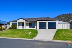 14 Montclair Avenue Wodonga VIC 3690 Perfectly positioned on an approx. 660m² fully landscaped block, in an elevated pocket of the Country Club Estate, sits this lovely north facing four-bedroom family home. Spacious, and light and bright throughout with perfect presentation and neutral décor, good window coverings, paint, and carpets, and neighboured by quality homes. There are four good sized bedrooms on offer – the master is situated at the front of the house, boasting an ensuite with oversized shower and built in robes, whilst the three minor bedrooms all come off the hallway and have built in robes and share the updated family bathroom with a separate toilet. The very functional and modern kitchen has ample cupboards, stainless steel appliances, gas cook top, electric under-bench oven and is positioned to overlook the large, light, and bright north facing family room with tiled floors. Offering a wonderful outlook from its elevated position in the street, the home boasts a formal living area. There is ducted gas heating to warm the home in winter and ducted evaporative cooling for the summer months to ensure year-round comfort. Outside will instantly appeal – off the family room sits the large 3.7 x 7.0m undercover alfresco area, ideal for year-round entertaining, this area overlooks the great sized backyard. There is also excellent rear yard access through the double side gates with space to store the boat or trailer. The rear yard offers the space and room to possibly add a pool or shedding STCA. To complete all on offer is the oversized 6.0 x 8.6m double garage, offering plenty of room for the vehicles and workbench as well as direct internal access into the home.