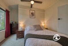 31 Main St Nar Nar Goon VIC 3812 $730,000 - $800,000 Main Street prominence and a large 2000sqm allotment, this property represents a potential to live in, invest or further develop the site further (STCA). Tastefully updated over the years, comprising of three double bedrooms all with wardrobes and serviced by a deluxe bathroom and two toilets. The open plan design that incorporates the family room, meals area adjacent to the kitchen with large work surfaces, dishwasher and ample storage. A separate rumpus room at the rear of the home is ideal for the growing family or home office! Outside, a very spacious rear yard hosts a covered outdoor area and a large machinery shed with mezzanine storage and lean-to. With an easy stroll to the local shops, primary schools, sporting facilities, V-Line train station and easy access to the M1 freeway.