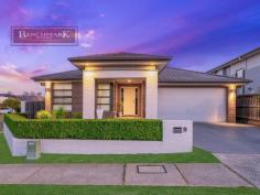 9 Sandstock St Moorebank NSW 2170 Located in the desirable suburb of Georges Fair, this luxurious single level home presents spacious living inside and out. Boasting a gourmet Kitchen with high quality inclusions throughout including Walk in pantry, stone benchtops, gas cooking, overlooking family and dining areas Situated on a corner block, this modern home provides low maintenance, 2 separate outdoor entertaining areas and is only a 3 minutes walk to Brighton Lakes Golf Club. Features include: - Master bedroom with walk in robe and ensuite - An additional 3 large bedrooms with Built in robes - Separate rumpus or theatre room - 2 car remote controlled garage - Blackbutt Floorboards - Intercom - Plenty of storage - Ducted air conditioning - Gas heating - Updated hot water system - North facing corner block - Approx.. 507 sqm