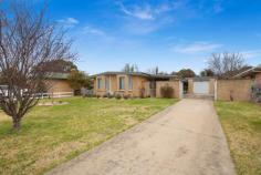 90 Lynches Road Armidale NSW 2350 $499,000 Conveniently located in a sought after south hill area, 90 Lynches Road is comprised of a three bedroom brick and tile home on a level and fully fenced 974 sqm block. The open plan kitchen living and dining area entertains a north facing aspect and in complete with wood heating reverse cycle air and a gas outlet. Large vertical windows allow for ample light creating a comfortable and free flowing area throughout the day. Recently updated, the kitchen offers a timeless neutral colour palette, with stainless steel appliances, a pantry and a breakfast sitting area with easy maintenance tile floors underfoot. Three bedrooms are finished with carpets and the master and second bedroom are home to built in robes. A single bathroom provides a shower, bath, vanity and separate toilet and the laundry includes storage, sink and external access to the yard. Outside the fully fenced yard offers neat and tidy gardens, a covered sitting area, and single lock up garage with a formed cement driveway. Neat as a pin and as complete as they come, this home is a true walk right in and sit right down prospect. With the backing of a sought after, family friendly and convenient location.