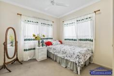 6 Wenlock Close MOUNT SHERIDAN QLD 4868 $600,000 Sitting proudly amongst other quality homes in the heart of Forest Gardens Estate sits this magnificent Queenslander-style home. With expansive East, and Southeast views from the back entertaining deck that will leave you feeling relaxed and at home. Built in 2007 with stainless steel frames and hardy plank external walls, this home speaks of quality and retains all of the best features of an original Queenslander, capturing the cool breezes year-round. Comprising, but not limited to: * Double-door entry to the air-conditioned open-plan living/dining room, lots of natural light and Cyprus pine flooring create a welcoming vibe. * Full-sized kitchen with centre island bench for extra prepping space. * High ceilings, security screened and to save money a 6.5KW solar power system. * Master bedroom with air-conditioning, walk-in robe, ensuite and French doors opening out to the Juliet balcony. * Bedrooms two and three have built-in robes. * Fourth bedroom is linked to the dining area and is currently used as an office. * The rear back patio deck is great for entertaining or relaxing with your morning cuppa. * Internal stairs take you downstairs to the work area, storage room, laundry and garage. * Gazebo and Spa complete the entertainment. * A fenced 629m2 block of flat land with immaculate established gardens and lawns. Located just a short walk from Monsoon Terrace Park and only a three to five-minute drive to Mount Sheridan Shopping Plaza, T.A.S Private School, St Mary's Catholic College, Cairns Golf Course and access to the Bruce Highway.