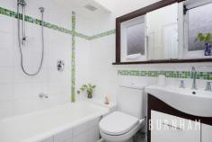 43 Summerhill Rd Footscray VIC 3011 $965,000 - $1,060,000 Situated on approximately 440m2 of land; blending the charm of period features, the comfortability of modern updates and a central blue-chip location, this generous three-bedroom house presents as the perfect family home. This beautifully kept and well-maintained Californian Bungalow flaunts all the appeal of its 1930’s, art deco origin. Featuring leadlight glass windows and doors, a classic yet spacious layout, ceiling roses and original timber trim and floorboards throughout. Within the home, the proportions are generous from end-to-end. In the light-filled living and dining space, decorative bi-fold doors allow for the flexibility of an airy open-plan layout or formal, separate zones. The heart of the home, the kitchen, features ample storage, gas stove and a large meals area. Retreat to the bright and spacious primary bedrooms with built-in robes. Updated recently, the bathroom has a clean, relaxing feel and consists of a vanity with storage, original casement windows, shaving cabinet, feature tiles and bathtub. A walk-through laundry and toilet, sunroom and quiet study complete the primary residence. The large, versatile studio at the rear of the block is bathed with light as it overlooks the surrounding garden. With established trees, low-maintenance plants, a decked seating area and shed, the backyard is a tranquil sanctuary for a growing family. Located approximately 8kms from Melbourne’s CBD, an abundance of amenities are within arms stretch. West Footscray train station is only a 3min drive away, Footscray Hospital is within 300m and Central West Shopping Centre is a short 5min drive. Numerous reserves and parklands, Highpoint Shopping Centre, coveted primary and secondary schools, quirky cafes and renowned restaurants are all just around the corner. Key features: – 440m2 of land (approximately) – Two large primary bedrooms – Kitchen with meals area – Bright and airy living/dining space – Updated bathroom with tub – Sunroom – Quiet study at the rear – Walk-through laundry and toilet – Separate, versatile studio – Low-maintenance backyard with a seating area and shed Additional features: – Driveway parking for two cars – Split system heating and cooling in the bedrooms, living space and studio – Low-maintenance front garden – Decked verandah – Two central linen cupboards