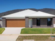 33 Glenwood Bvd Baranduda VIC 3691 $569,000 Set in popular Glenwood Estate, relocate before Christmas to an estate with stunning views and quiet living. Newly constructed with a parkland outlook, this home encompasses a contemporary living design with a modern yet neutral colour palette and well considered floorplan. Offering three bedrooms, the master suite is privately located to the front of the home and features a walk in robe and a well appointed ensuite cleverly concealed behind a barn door. A further two bedrooms all with built in robes are serviced by the light and bright full family bathroom. Multiple living options include a separate formal lounge and an open plan kitchen, living and dining arrangement which seamlessly connects to the alfresco for those that love to entertain. The centrally located kitchen features an island bench for informal dining, modern stainless steel appliances including electric oven, gas cooktop and dishwasher, and a generous walk in pantry with access to the laundry and garage. Additional features include a double garage with both remote and internal access, ducted heating and evaporative cooling for your comfort, partial double glazing, full laundry, built in linen closet and a secure yard. The location offers you easy access to the recently completed IGA Supermarket just down the road or a short 10 minute commute will have you in the heart of CBD Wodonga.