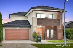 57 Springbank Rd Wollert VIC 3750 This grand home offers a great open-plan layout partnered with timeless design. Adding a touch of luxury to everyday living, this home features multiple living areas with a spacious lounge downstairs and open plan with main lounge opening into the large alfresco. The kitchen opening into the meals and lounge makes it convenient to entertain family and friends. Store all the essentials in the walk-in pantry and extra linen closets provided. With a retreat upstairs ideal for kids and teens alike for a games room or a study. This five-bedroom home is perfect for families. The master is ideal with an ensuite with double vanities and a large shower. Dress up in this large walk-in robe with ease and Enjoy a cuppa out in the balcony before rushing off to work. Let the kids get ready in the central bath with a bathtub and shower. Convenient built-in robes in all 3 bedrooms. Stand Out Features: • Five bedroom • Two Bathroom • Double Garage • High Ceilings • Upgraded façade. • Home Office / 5th Bedroom • Formal Living Area • Stone benchtops to kitchen with waterfall. • Walk In pantry • Exposed aggregate to driveway and path • LED downlights to all areas • Alfresco • Glass Splashback • 900mm appliances • Dishwasher • Quality tapware • Expansive laundry • Quality Window Furnishings • Spacious Master with ensuite and his n hers walk in robes • Ensuite with double vanity • Floor to ceiling tiles in bathrooms with stone countertops. • Decorative Lighting • Walking distance to Al-Siraat College • Quick access to Hume freeway Close to amenities such as Aurora shopping village