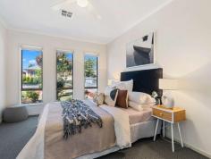 19A Reece Avenue Klemzig SA 5087 $695,000 - $735,000 This gorgeous, 2013 built, single level, three bedroom plus study/fourth bedroom, two bathroom, courtyard home, boasts a whopping 150sqm approx. of quality indoor and outdoor living space and sits on a fabulous, easy care allotment of some 348sqm approx. Handy to absolutely everything including Kindergarten schooling at the end of the street and Klemzig Primary School just a block or two walk from home. Coles supermarket shopping and public transport is equally as close, whilst the city is just a short ten minute drive for your daily CBD commute! The perfect 'Lock it and Leave it' low maintenance home, featuring spacious bedrooms, all with built ins and a walk through robe and ensuite to the master, along with the class of high ceilings and a 12 panel solar power system, this wonderful home is deceivingly unassuming from the street and just ideal for downsizers or investors! Off street parking for two leads to the secure under the main roof garaging with auto panel lift door and internal access for convenience, whilst the beautifully manicured, low care front yard, delivers the ideal 'Lock it and Leave it' property, with little or no maintenance to worry about in your absence. Stepping into the residence itself and the modern décor, tones and trim, along with the sheer elegance of the porcelain floor tiling throughout accentuates the feeling of spaciousness on offer, whilst the class of the extra high ceilings to the rear half of the residence, stamp the home with an air of pure opulence. Enjoying the services of a large walk through robe to the convenience of a gorgeous ensuite, the master bedroom is just reward for the hard working home owner, at the end of a long and busy day. A little further down the passage, past the sliding doors that leads out to a lovely little outdoor undercover retreat perfect for the morning coffee, and past two more spacious bedrooms, both with built in robes, is the homes main bathroom, featuring shower and bath facilities, a vanity and a separate toilet for family convenience. The laundry has independent access to the clothesline at the rear whilst right opposite, bi fold doors open up to the wonderful study/rumpus/games room/home office or perhaps a fourth bedroom, depending on your needs. So much flexibility! From here the home blossoms in fabulous open plan living, commanding breath takingly high ceilings that accentuate the spaciousness on show before you. An enormous informal family living room is adjoined by the informal dining area and overlooked by the wonderful central feature kitchen, ensuring the chef of the day, is a part of all the families conversation. The kitchen itself is wonderfully functional and family friendly with a wide breakfast bar playing home to a stainless steel dishwasher, continuing the theme of eye catching excellence. Miles of cupboard and bench space with wonderful cabinetry, is punctuated with the class of a stainless steel electric oven, with a four burner gas cook top and will have the chef of the day drooling in culinary bliss. The informal lounge room at the very rear commands a light, bright and airy ambience, courtesy of the sliding doors out to the rear undercover outdoor entertaining area, which in turn, overlooks the very private rear yard, dressed beautifully in a quality artificial turf, delivering low care heaven, yet just perfect for the kids and family pets. With endless added features such as the central gas heating and the ducted evaporative cooling, or the fibre to the premise NBN connected, or the 1.5KW solar, this fabulous property is ideal for retirees looking to downsize to something more manageable or perhaps, the perfect option for an investor or owner occupier heaven! Being offered for sale by Scott Nowak from Ray White 0412 567 212 RLA: 262999 and Adrian Campbell from Aldinga Beach Real Estate Service 0405 817 769.