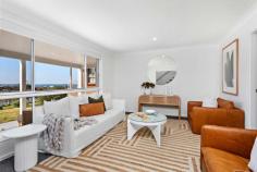74 Barton Drive Kiama Downs NSW 2533 Bathed in sunlight from its prized northern aspect and enjoying expansive ocean views, this as-new family home has been completely re-done by renowned 'Cooback Designer Homes' and offers a move-in ready residence with all the boxes ticked and nothing left to do but begin enjoying this stunning property. Inside you will find 4 dble sized bedrooms with BIW's including master with ensuite and walk-in, multiple living areas plus extra study, quality kitchen with walk-in pantry + SMEG appliances and stone benchtops, sleek hybrid timber flooring throughout with carpet in the bedrooms, dual zone ducted A/C + extra split system, and oversized dble garage with remote control and internal access. Step outside to an expansive undercover entertaining/BBQ area that flows seamlessly through to a secure and private level yard with plenty of room for the entire family and their friends. Located in the family friendly precinct in Kiama Downs less than 800m walk to the pristine sands of 'Bombo' beach and schools, daycare, shops, cafes and playing fields all within walking distance, it is easy to see why this location is so highly sought after.