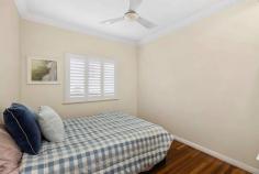 114 Market Street Indooroopilly QLD 4068 Brimming with charming kerb appeal, this inviting c1950s Post War home is well cared for and wonderfully liveable, plus offers scope for an astute buyer to add further value. It occupies an elevated 607sqm flood free block in a family-friendly neighbourhood, a short walk from Ambrose Treacy College, Jack Bowers Oval, bus stops and shops. Highset with attractive sunroom entrance to welcome guests Cosy air conditioned lounge room features ornate cornices French doors open to screened deck for casual entertaining Enjoys city glimpses, leafy outlooks and fresh summer breezes Overlooks fenced backyard with expansive lawn for the kids Kitchen has timber cabinetry, gas cooking, Miele dishwasher Good sized bedrooms, bathroom includes bath, terrazzo floors Polished timber floors, plantation shutters, security screens Large underhouse multi-purpose area, extra w/c and storage Potential to raise to legal height and extend layout (STCA) Off street parking, carport, cottage garden with poinciana Metres to access Western Freeway Bikeway, cafés and parks Near short-cut underpass to Moggill Road, Metrowest shops Few minutes' drive to the M5, Indooroopilly Shopping Centre Indooroopilly State, Indooroopilly State High school catchment