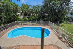 20 CHARLES HODGE AVENUE MOUNT PLEASANT QLD 4740 $650,000 Savvy Buyers, this one is for you! Location, location, location in sought-after Mt Pleasant; massive corner block with: - 2 street access; - Fully fenced corner block with room for boat, caravan, or trailers; - 3 car lock-up garage accommodation; - In-ground pool; - Established fruit trees & brand new cyclone-rated garden shed; - Huge outdoor entertaining deck with aluminium shutters & pull down blinds; - The most spacious two-storey home with 3 bedrooms upstairs; - Fully enclosed downstairs offering additional bathroom, office/rumpus & storage! There's not too much more you could ask for! Walking into this massive brick-rendered home, the spaciousness & separate living areas will strike you immediately. The formal entry, which could act as a great work-from-home office space, is very welcoming & is tiled & freshly painted. Leading from the formal entry, you begin to discover all of the space offered downstairs &, although not being legal height, it still offers two separate rooms: the first being very large, perfect for a rumpus area; the second room containing a built-in storage cupboard plus a very modern ensuite boasting shower, vanity & toilet, all in white bright tiles. The "Harry Potter" Storage under the stairs is fantastic storage space, in addition to the "Home Brew" Storage area in the enormous garage. The triple bay garage comprises of 3 oversized bays with the addition of a laundry, third toilet, & the third garage bay set up as a workshop with shelves & cabinets included in the sale. Stepping out from the laundry is a large covered entertaining area (under the upstairs deck) that flows directly to the pool & fully fenced, abundant backyard. Leading upstairs, from the formal entry be introduced to a very large, open plan, lounge dining kitchen area that encompasses the enormous outdoor entertaining deck via sliding glass doors. Upstairs offers three large bedrooms and a 2-pac kitchen complete with electric oven, dishwasher, ample bench space & cupboards, large pantry & a big window that overlooks the deck. The massive back deck is ideal for entertaining and overlooks the sparkling pool and fruit trees (opportunity to be semi-self-sufficient) & enjoys white aluminium shutters & pull-down blinds which creates a whole new outdoor living area in inclement weather. The three upstairs bedrooms all enjoy high ceilings, built in wardrobes, air conditioning, ceiling fans & carpet. The spacious rendered brick construction is set on a large corner block with access from two streets: Charles Hodge Avenue and Bona Vista Drive. The Bona Vista driveway continues along the side of the house where space remains for a high carport to house boats, caravans etc. You certainly won't be short of room for the whole family and the location is so handy with Mt. Pleasant and Greenfield Shopping Centres only minutes away. You can take a walk to the tavern for a quick meal or take the kids to the cinemas if they're not in the pool! As the new owners of 20 Charles Hodge Avenue, you get all of this on a spacious 801m2 corner block. It's just waiting for your family to call it home. Don't delay and contact Robyn to arrange an inspection.