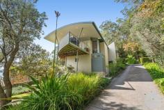 15 Kallaroo Street Corlette NSW 2315 $2,400,000 Situated a short 300m walk away from the glistening shores of Corlette Beach, this exquisite house offers a truly enviable beachside lifestyle. With a perfect northern orientation, the architecturally designed and quality-built home bathes in natural sunlight and enjoys refreshing ocean breezes year-round whilst providing the opportunity to live on the one level. The striking modern exterior hints at the modern luxury and comfort that awaits within. As you step inside, you are immediately drawn to the captivating water views that beckon through expansive and carefully placed array of glass windows and doors. Greeted by the warmth of timber flooring throughout, the neutral interiors create a soothing ambiance that complements the coastal surroundings. The heart of the home boasts a sleek kitchen adorned with crisp & modern cabinetry, quality stone benchtops and cooktop. Miele appliances make cooking a pleasure, while the timeless, open layout ensures seamless interaction with guests and family. The master suite and garage is also located on the main floor allowing you the opportunity to live all on the one level. The balcony presents an ideal setting for entertaining, where you can soak in the views while hosting gatherings, enjoying a morning cup of coffee and book or simply unwinding after a fun-filled day at the beach. This thoughtfully designed home accommodates four spacious bedrooms, each designed with comfort in mind plus a study. The residence also offers a second living room downstairs which could also be used as a fifth bedroom. The main bedroom, a true retreat, treats you to expansive water views and features a private ensuite adorned with a large bath that invites you to indulge in a relaxing soak after a long day. Modern elegance meets practicality with the addition of a generous storage area on the lower level, providing ample space for your belongings. Whether you're looking to store beach gear or household items, this feature adds a layer of convenience to daily living. In addition to this, a double remote garage provides secure parking for your vehicles. Other features include the 'Green Credentials', the perfect northern aspect of the home in conjunction with an efficient 'Rheem Heat Pump' Hot Water System meaning that the home requires less electricity to be used, therefore your electricity bills are kept to a minimum. Outside, the established, easy cared gardens offer a serene backdrop, inviting you to connect with nature. The property's unique positioning, backing onto a reserve, ensures a peaceful and uninterrupted outlook, allowing you to revel in a sense of tranquillity that's truly rare. Experience the epitome of coastal living in a location that combines proximity to the beach with the tranquillity of reserve-backed living. This house offers not just a home, but a lifestyle-one where every day is a beach vacation and where the comforts of modern living merge seamlessly with the beauty of nature. Do not delay or you will be disappointed. Please contact Dane Queenan on 0412 351 819, Tristan Esquilant on 0435 642 942 or Erin Sharp on 0400 560 067 to receive a full information package including recent sales, rental appraisals, pest & building inspection reports and contract for sale.