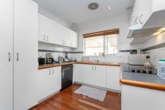23 Williamson Ave Belmont WA 6104 $549,000 Incredible value here with a gorgeous double brick and tile 1960’s character cottage on a full size 610m2 block. Sporting a lot of it’s original character charm with polished jarrah floors, character cornice and jarrah windows, door frames and architraves this is a charming little window into yesteryear. The property has also been updated with many modern conveniences including a previously renovated kitchen with 4 element built in electric stove and built in electric oven, Fujitsu reverse cycle air conditioning in the lounge and Panasonic reverse cycle air conditioning to beds 1 & 2, built in robes to the master bedroom, security screens to the front and rear doors and windows throughout the home, renovated laundry with extra storage, automatic reticulation with a bore, a huge undercover rear patio for entertaining, under cover parking for up to 3 cars and a powered workshop at the rear. Williamson Avenue is also a relatively quiet street but a very central location round 2km from the Swan River & surrounding parklands, 2.8kms to Belmont Forum, 2.8kms from Ascot Racecourse, 9.1kms drive to Perth Airport and 9.7kms drive from Perth City Center. Features at a Glance: • 3 Bed 1 Bath 3 Car Carport 1 Powered Workshop • 94m2 Internally with 124m2 of Built Area on 610m2 of Land • Renovated kitchen with built in 4 element electric stove & built in electric oven • Renovated laundry with extra storage • Split system reverse cycle air conditioning to lounge, bed 1 and bed 2 • Whitegoods package to be sold with the property including LG Dishwasher, AEG Washing Machine and Samsung Fridge • Central location round 2km from the Swan River & surrounding parklands, 2.8kms to Belmont Forum, 2.8kms from Ascot Racecourse, 9.1kms drive to Perth Airport and 9.7kms drive from Perth City Center • Strong Estimated rental return of around $500 per week • Council Rates: $1,433 p/a Water Rates: $1,032 p/a