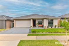 14 Whyalla Street Jordan Springs NSW 2747 Perfectly positioned in a whisper quiet street, this beautifully presented and meticulously maintained family home is a must to inspect. With its modern design, spacious layout and prime location, it’s the perfect place to create lasting memories. Introducing 14 Whyalla Street, Jordan Springs! Step inside and be greeted by the bright and airy living area, ideal for entertaining. The open-plan kitchen features sleek countertops, ample storage space and top-of-the-line appliances, making cooking a breeze. Boasting ducted vacuum, plantation shutters and downlights throughout, ducted air conditioning with zoning, powder room, two or more living areas, 4 toilets, lovely main bathroom and much more! The resort suite is perfectly finished featuring an ensuite, kitchenette, ducted vacuum point, split system air conditioning and spacious living, it will feel like home away from home. The indoor/outdoor transition is seamless and the backyard is brilliant for families who love to entertain with a beautiful alfresco area. All set in a highly sought after location, only moments from local schools, shops, parks, hotel and transport. Opportunities like this don’t last long, so don’t miss out on your chance to make this your dream home!