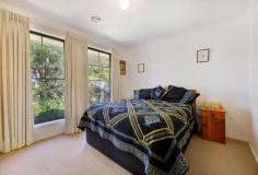 29D Birriga Ave Bundanoon NSW 2578 $995,000 A well positioned residence down a quiet private road set amongst an established garden ensuring privacy, an abundance of bird life and plenty of sunshine. A fabulous versatile floor plan for the whole family, downsizers and entertainers. High points The home is configured as a four bedroom with two well sized and appointed bathrooms, the master suite well away from the family / guest wing. Excellent storage options in all bedrooms. Offering substantial living options with the newly renovated kitchen centrally located to flow from both the casual living, dining space to the cosy more formal spaces and the outdoor entertaining terrace making it a great family home. Quality finishes in the kitchen with funky glass splash back, stone benches and excellent storage options. New engineered flooring to the kitchen / family space with carpet throughout the remainder of the residence. Gas ducted heating and all town services available and connected. The double garage offers internal access to the entry hall plus there is further space for two more vehicles in the driveway. An added bonus is the newly constructed studio in the rear garden, perfect for teenagers, work from home space, artist studio or workshop. The lawn free property offers an established selection of ornamentals, shrubs with various garden beds and a huge selection of fruit trees perfect for jam making. The rear enclosed veggie garden is also well placed and bathed in sunshine with the chook house / run an added bonus. A thoughtfully designed working garden. An immaculate property for the whole family or those who love to entertain, call to arrange your private inspection.