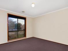 1 Muscio Place Chisholm ACT 2905 $800,000 Looking for a large block ? This is it.... ! Angled across the block this privately built 3 bedroom house has a renovated kitchen (2018) and an as new bathroom and is ready to purchase NOW ! The potential for this property is unlimited. Dual access, double brick garage (2 remote auto doors), large covered rear pergola. Features * 1134 sqm block * 3 bedrooms * Renovated kitchen (2018) stone bench top lots of cupboards * Fully tiled bathroom (new 2023) * Carpets, blinds recessed lights * Ducted gas heating * Wall air conditioner in dining area * Separate toilet and laundry * Large covered rear pergola * Small covered pergola at side * Fully enclosed rear with colour bond fencing * Double garage with auto remote on both doors Very easy access to Chisholm Primary, Caroline Chisholm High and local shops.
