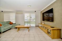 35 Coronata Dr Warnbro WA 6169 $489,000 Embrace the potential of this beautifully renovated 3-bedroom home set on a spacious 680sqm block, offering multiple living spaces and modern comforts. With unrestricted side access and room to add a pool, large workshop or a Granny Flat (STCA), the possibilities are endless. You will love the modern colour palette, renovated kitchen with soft close drawers and doors, beautiful new bathroom, 6.6kw solar electricity system, massive gabled patio with cafe blinds, hardstand at the front, plus unrestricted wide side access to a secure hardstand at the rear, ideal for storing a boat and caravan. Just minutes from your doorstep you have access to Aqua Jetty swimming pool and gym, Warnbro Fair Shopping Centre, Warnbro Train Station, primary and secondary schools, cafes and restaurants, lush parks with playgrounds, medical facilities, and a short drive to our pristine coastlines and many family-friendly beaches, you can now have the lifestyle you have always wanted at a price you can afford. Ideally suited to a young family, savvy first home buyer, astute investor, downsizer, or FIFO/Navy workers, with room to entertain and store all the toys. Independent Rental Appraisal: in the vicinity of $550 per week. Features include: • Reverse cycle air-conditioning • Two internal living areas plus a massive outdoor entertaining area • Renovated kitchen complete with stainless steel appliances, soft close drawers and doors • King-sized master bedroom with walk-in robe and ceiling fan • Double-sized minor bedrooms, all with built-in robes and ceiling fans • Renovated main bathroom with separate shower and bath • Separate laundry with linen press and plenty of room for a washer and dryer • Massive gabled, outdoor entertaining area complete with cafe blinds • One and half-sized garage with auto roller door • Garden shed and automatic reticulation • Hardstand at the front plus secure gated access to a second hardstand • Plenty of room to add a granny flat (STCA) which could utilise the separate gated side access • Built in 1990 on a large 680sqm block of prime land Don't miss out on this fantastic opportunity, with nothing left to do but move in and the potential to add value in the future by turning it into a dual-key property!