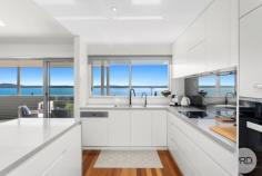 15 Kallaroo Street Corlette NSW 2315 $2,400,000 Situated a short 300m walk away from the glistening shores of Corlette Beach, this exquisite house offers a truly enviable beachside lifestyle. With a perfect northern orientation, the architecturally designed and quality-built home bathes in natural sunlight and enjoys refreshing ocean breezes year-round whilst providing the opportunity to live on the one level. The striking modern exterior hints at the modern luxury and comfort that awaits within. As you step inside, you are immediately drawn to the captivating water views that beckon through expansive and carefully placed array of glass windows and doors. Greeted by the warmth of timber flooring throughout, the neutral interiors create a soothing ambiance that complements the coastal surroundings. The heart of the home boasts a sleek kitchen adorned with crisp & modern cabinetry, quality stone benchtops and cooktop. Miele appliances make cooking a pleasure, while the timeless, open layout ensures seamless interaction with guests and family. The master suite and garage is also located on the main floor allowing you the opportunity to live all on the one level. The balcony presents an ideal setting for entertaining, where you can soak in the views while hosting gatherings, enjoying a morning cup of coffee and book or simply unwinding after a fun-filled day at the beach. This thoughtfully designed home accommodates four spacious bedrooms, each designed with comfort in mind plus a study. The residence also offers a second living room downstairs which could also be used as a fifth bedroom. The main bedroom, a true retreat, treats you to expansive water views and features a private ensuite adorned with a large bath that invites you to indulge in a relaxing soak after a long day. Modern elegance meets practicality with the addition of a generous storage area on the lower level, providing ample space for your belongings. Whether you're looking to store beach gear or household items, this feature adds a layer of convenience to daily living. In addition to this, a double remote garage provides secure parking for your vehicles. Other features include the 'Green Credentials', the perfect northern aspect of the home in conjunction with an efficient 'Rheem Heat Pump' Hot Water System meaning that the home requires less electricity to be used, therefore your electricity bills are kept to a minimum. Outside, the established, easy cared gardens offer a serene backdrop, inviting you to connect with nature. The property's unique positioning, backing onto a reserve, ensures a peaceful and uninterrupted outlook, allowing you to revel in a sense of tranquillity that's truly rare. Experience the epitome of coastal living in a location that combines proximity to the beach with the tranquillity of reserve-backed living. This house offers not just a home, but a lifestyle-one where every day is a beach vacation and where the comforts of modern living merge seamlessly with the beauty of nature. Do not delay or you will be disappointed. Please contact Dane Queenan on 0412 351 819, Tristan Esquilant on 0435 642 942 or Erin Sharp on 0400 560 067 to receive a full information package including recent sales, rental appraisals, pest & building inspection reports and contract for sale.