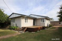 1 Orange Street Biloela QLD 4715 $280,000 Situated on a 771sqm corner allotment, this tidy home offers an attractive investment opportunity - currently returning $380 per week with a fixed-term lease in place until August 2024. The home is situated within walking distance to all amenities, being only 1km* from the CBD and 1.5km* from the local Schools. The entrance of the home features a solid timber deck, offering an inviting location to relax and enjoy the morning sun. The open-plan living room with cork flooring is air-conditioned and is combined with the kitchen which has electric appliances including a dishwasher. The three bedrooms are all carpeted with ceiling fans, built-in wardrobes and air-conditioning to the master. The family bathroom has been finished with neutral tones and includes a shower over bath, linen cupboard and a toilet. For added security, there is security screens throughout the property and a fully fenced yard. There is side vehicle access from Kariboe Street to the shed which has power, otherwise there is room for further car accommodation under the carport which could also be used as an entertainment area.