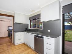 1 Muscio Place Chisholm ACT 2905 $800,000 Looking for a large block ? This is it.... ! Angled across the block this privately built 3 bedroom house has a renovated kitchen (2018) and an as new bathroom and is ready to purchase NOW ! The potential for this property is unlimited. Dual access, double brick garage (2 remote auto doors), large covered rear pergola. Features * 1134 sqm block * 3 bedrooms * Renovated kitchen (2018) stone bench top lots of cupboards * Fully tiled bathroom (new 2023) * Carpets, blinds recessed lights * Ducted gas heating * Wall air conditioner in dining area * Separate toilet and laundry * Large covered rear pergola * Small covered pergola at side * Fully enclosed rear with colour bond fencing * Double garage with auto remote on both doors Very easy access to Chisholm Primary, Caroline Chisholm High and local shops.
