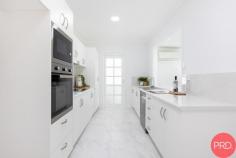 55 Adelaide Street Raymond Terrace NSW 2324 Discover the perfect blend of comfort, style, and space at 55 Adelaide Street, Raymond Terrace, NSW, 2324. This beautifully renovated 4-bedroom, 2-bathroom house is an ideal choice for first home buyers, growing families, and savvy investors alike. As you approach this delightful property, you'll be instantly impressed by the manicured front yard and undeniable street appeal. Step inside, and you'll be greeted by a tastefully renovated interior featuring premium finishes and marble-look tiles. The spacious two-car garage provides ample storage and convenient internal access to the property. Enjoy seamless open-plan living with the stylish kitchen and dining area, which offers a superb view of the backyard and outdoor entertaining space. The chef's kitchen boasts stone benchtops, a breakfast bar, a pantry, and plenty of storage, all complemented by a split-system air conditioning unit. All four bedrooms feature plush carpeted flooring and ceiling fans, with the master bedroom offering the added luxury of an ensuite, built-in robe, and split-system air conditioning. The outdoor undercover area is perfect for year-round entertaining, while the large backyard presents endless potential for a swimming pool or other personal touches. A fully fenced backyard ensures privacy and security, and also includes a garden shed, a large water tank, and an extra parking space for the granny flat. The self-contained granny flat comes complete with a carport, split-system air conditioning, and a mix of laminate and carpeted flooring, offering endless possibilities for guests, teenagers, or even rental income. Don't miss this exceptional opportunity to secure your dream home or investment at 55 Adelaide Street, Raymond Terrace, NSW, 2324. With its stylish finishes, versatile living spaces, and generous 759 square metre land size, this property is sure to impress.