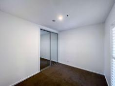 1008/2 Gribble Street Gungahlin ACT 2912 $430,000+ Imagine spending summer at a rooftop barbecue overlooking Yerrabi Pond, or completing languid laps in a 20-metre resort-style pool. Be spoilt for choice with shared amenities that also include an onsite gym when you snap up this stylish apartment in the Jade complex at Gungahlin. Flaunting stylish finishes including timber floors to the living areas and large-format tiles to the bathroom, apartment number 1008 also benefits from a generous covered balcony that has ample room for an outdoor table. The sleek central kitchen features stone benchtops, an induction cooktop, microwave niche and excellent storage, while additional storage can be found at the entry, with a full-length coat closet, and in the basement storage cage. Two generous bedrooms have built-in wardrobes and a chic, well-designed shared bathroom also boasts a European-style laundry. This well-situated and secure apartment puts you a hair's breadth from Gungahlin Town Centre with the convenience of shopping, dining and easy access to light rail. Also just a short drive to the CBD, ANU and UC, making it the ideal first home or investment property. Features include: • 10th floor as-new apartment in Jade complex • EER of 6.0 • Recently tenanted for $520pw • Vacant possession available • Modern kitchen with stainless-steel appliances • Quality timber floors to kitchen/dining • Carpet to bedrooms • Covered balcony • Split-system heating and cooling • Stylish bathroom with face-level hidden storage and generous shower • Intercom and lift access • Secure basement car space • Facilities include swimming pool, gym, pizza oven and BBQ area..