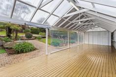 21 Rajani Road Helensburgh NSW 2508 Situated in a highly sought-after pocket of Helensburgh, peacefully nestled in leafy surrounds, this generously proportioned and open plan home is ideal for the growing or grown family. Offering light-filled interiors and a stunning outlook over bushland, positioned on 834m2 parcel of land with rear lane access, this beautiful home is ready to welcome a new family. Property features: • Modern kitchen looking out to landscaped gardens • Generous living area flows to balcony ideal for taking in the beautiful sunsets • Five bedrooms, master with ensuite, walk in robe and balcony • Well-appointed bright main bathroom and separate toilet • Spacious covered alfresco deck ideal for entertaining family and friends • Established low maintenance gardens • Single car lock up garage • Rear Lane access • 834m2 parcel of land • This property is conveniently located in peaceful surroundings, yet just a short stroll to Helensburgh town centre, local schools and parklands. To truly appreciate all this stunning home has to offer, an inspection is a must.