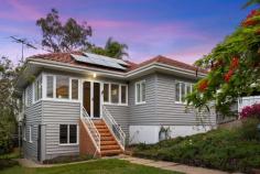 114 Market Street Indooroopilly QLD 4068 Brimming with charming kerb appeal, this inviting c1950s Post War home is well cared for and wonderfully liveable, plus offers scope for an astute buyer to add further value. It occupies an elevated 607sqm flood free block in a family-friendly neighbourhood, a short walk from Ambrose Treacy College, Jack Bowers Oval, bus stops and shops. Highset with attractive sunroom entrance to welcome guests Cosy air conditioned lounge room features ornate cornices French doors open to screened deck for casual entertaining Enjoys city glimpses, leafy outlooks and fresh summer breezes Overlooks fenced backyard with expansive lawn for the kids Kitchen has timber cabinetry, gas cooking, Miele dishwasher Good sized bedrooms, bathroom includes bath, terrazzo floors Polished timber floors, plantation shutters, security screens Large underhouse multi-purpose area, extra w/c and storage Potential to raise to legal height and extend layout (STCA) Off street parking, carport, cottage garden with poinciana Metres to access Western Freeway Bikeway, cafés and parks Near short-cut underpass to Moggill Road, Metrowest shops Few minutes' drive to the M5, Indooroopilly Shopping Centre Indooroopilly State, Indooroopilly State High school catchment