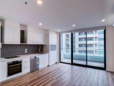 1008/2 Gribble Street Gungahlin ACT 2912 $430,000+ Imagine spending summer at a rooftop barbecue overlooking Yerrabi Pond, or completing languid laps in a 20-metre resort-style pool. Be spoilt for choice with shared amenities that also include an onsite gym when you snap up this stylish apartment in the Jade complex at Gungahlin. Flaunting stylish finishes including timber floors to the living areas and large-format tiles to the bathroom, apartment number 1008 also benefits from a generous covered balcony that has ample room for an outdoor table. The sleek central kitchen features stone benchtops, an induction cooktop, microwave niche and excellent storage, while additional storage can be found at the entry, with a full-length coat closet, and in the basement storage cage. Two generous bedrooms have built-in wardrobes and a chic, well-designed shared bathroom also boasts a European-style laundry. This well-situated and secure apartment puts you a hair's breadth from Gungahlin Town Centre with the convenience of shopping, dining and easy access to light rail. Also just a short drive to the CBD, ANU and UC, making it the ideal first home or investment property. Features include: • 10th floor as-new apartment in Jade complex • EER of 6.0 • Recently tenanted for $520pw • Vacant possession available • Modern kitchen with stainless-steel appliances • Quality timber floors to kitchen/dining • Carpet to bedrooms • Covered balcony • Split-system heating and cooling • Stylish bathroom with face-level hidden storage and generous shower • Intercom and lift access • Secure basement car space • Facilities include swimming pool, gym, pizza oven and BBQ area..