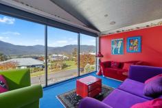 28 Fiddleback Drive Tawonga South VIC 3698 $1,500,000 - $1,600,000 Positioned in a picturesque Victorian High-Country valley is this extraordinary and ultra-modern home offering extensive unimpeded views of Mount Bogong and the Upper Kiewa Valley. This industrial themed and architecturally designed home features three bedrooms and two bathrooms with high end finishes, privacy, and elegance. Containing all the practicalities of modern living this property is set to impress and accommodate the demands of a wide range of purchasers. The breathtaking use of natural elements combine in a low maintenance front garden where slate stone flows featuring a dry creek bed with a modern fountain and gabion pillars which can be illuminated at night. An innovative above ground steel walkway reminiscent of a ski resort brings you to the remarkable entrance with a grand front door that welcomes you to this masterpiece of contemporary design unrivalled in scale, level of finish and sheer quality, this spectacular residence is unforgettable. This warm, luxurious tri-level home features extensive open plan living and is a banquet of bespoke design and detail with an industrial atmosphere comprising a lounge, kitchen, dining area and mezzanine above, all with stunning views of the surrounding countryside. The kitchen features top of the line appliances including an induction cook top on the large triangular island bench which has attached a glass breakfast bar. There is ample storage space in the kitchen with walk-in pantry, making it the perfect place for cooking and entertainment. The delightful adjacent dining area has an abundance of natural light from floor to ceiling tinted windows but transforms into an intimate and cosy dining area at night. Additional to the classic living areas there is a spacious upstairs mezzanine utilised as a sitting room offering spectacular unobstructed 180-degree views, day and night, of the Kiewa valley, Mount Bogong and the nearby township of Mount Beauty. A wonderful spot to sit and read a book or simply relax and drink in the view. Designed for grand scale alfresco entertaining the pool pavilion houses a heated 5-person spa, heated swim-jet pool with covers and a TV, perfect for all weather entertaining and being completely protected from the elements. The covered alfresco has an inside and outside counter connected to the kitchen by a bi-fold window to allow a seamless transition from indoor to outdoor living. It is an area that truly inspires and provides year-round poolside entertaining and an unparalleled lifestyle. The master bedroom is at the rear of the house and continues with the industrial and contemporary theme. Featuring a full room width, double access walk-in robe, an adjoining ensuite bathroom and large floor to ceiling windows looking out from the bedroom and ensuite over the large trees surrounding a flowing creek on the acreage behind the house. The subsequent two bedrooms are also substantial in size and have full width built-in robes. The third bedroom at the front of the house features large floor to ceiling window with spectacular views of the mountains. It is presently set up as a fully functional office/study but could be utilised as a bedroom if desired. The lowest level of the property is the most intricate containing a large workshop, garaging for 3 cars, a pool utility room containing washroom facilities and a room used as a garden shed with a separate entrance, all with concrete flooring and extensive built in cabinetry for storage facilities. Adjacent to the rear garage entrances is a large bituminous yard with ample space for a caravan, motor home or boat. The elegant gardens are low-maintenance with compact fruit trees and are auto drip irrigated for convenience. Additional features include, but are not limited to: • Double glazed windows throughout with large windows being lightly tinted with heat reduction and privacy film. • Instant hot water tap to a kitchen sink • Insinkerator in one kitchen sink • Professional reach and pull-out kitchen mixer tap • Extensive LED lights throughout • 30 solar panels with Tesla lithium battery backup • Home security alarm with outside video security cameras • Comprehensive audio-visual system with speakers and TV outlets throughout • 2x 6000litre rainwater tanks with submersible pump supplying water to toilets, laundry and some garden taps • Solar hot water service • Remote controlled automatic sliding gate to driveway entrance • Front bitumen driveway has additional off-street parking space • Garden shed under side of house • Large unused areas under floor of living area with potential for additional usable spaces for rooms or storage • Secure quality fencing for privacy The residence is situated on a small new estate with modern all underground services. The estate is 3km from Mount Beauty and is set in the middle of farmland and small acreages and is a mere 45 min drive from the snow at Falls Creek Ski Resort. The rural township of Tawonga is situated in the Kiewa Valley, North East Victoria in the Heart of the High Country. Tawonga is renowned for its majestic landscape and is central to a variety of recreational activities including fly fishing, horse riding, camping, water sports, downhill and cross-country skiing, snowboarding, golf, tennis, and mountain biking, bush walking, gliding, private aviation or simply absorbing nature. The region also boasts award winning restaurants and vineyards. The exterior of this property presents unique quality architecture, while the memorable interior spaces show an incomparable combination of sophistication, cutting edge design, and spectacular attention to details.