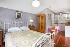 21 Harrison Street Blackheath NSW 2785 $1,375,000 to $1,425,000 Bursting with character and charm, this property features three distinct dwellings offering the ultimate in space and versatility. Each of the three is fully self-contained, offering privacy and all the modern conveniences you could ask for. All three establishments are bathed in natural light, with bright, open interiors and original detailing making this property a rarity in versatility and space. Well located close to the village in a quiet location with an established garden only adding to its appeal. FEATURES BREAKDOWN; • Professionally renovated character home Circa 1932 • Two bed house plus separate fully self contained one bed cottage plus garden studio • Offering several accommodation and work from home options. • The main house includes - light filled sunroom, separate dining room, slow combustion fireplace, kitchen with 1927 Success Fuel stove & upright gas stove, chandeliered bathroom with claw foot slipper bath, main bedroom with inbuilt floor to ceiling bookcases, and Stegbar windows and doors throughout with screens and key locks. • The one bedroom cottage includes - kitchen and bathroom, lead light period windows, gas heating, wooden floors and French windows • The garden studio includes - fully contained kitchen with refrigerator, pot belly fire, leadlight windows and French doors, double brick with timber floors. • Original detailing includes; timber flooring, three metre high ceilings, gorgeous stained glass windows, lovely ceiling detailing, chandeliers, and a sun filled bay window adding to the classic charm • 702m2 approx level block with garden studio • Established garden with feature fountain, paved entertaining areas for outdoor dining and relaxing and water tank. • Quiet cul-de-sac location only 1.5kms approx from town Offering original detailing throughout, this character home with cottage and garden studio offers the space and versatility needed to create an ideally unique home.