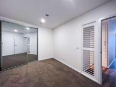 1008/2 Gribble Street Gungahlin ACT 2912 $430,000+ Imagine spending summer at a rooftop barbecue overlooking Yerrabi Pond, or completing languid laps in a 20-metre resort-style pool. Be spoilt for choice with shared amenities that also include an onsite gym when you snap up this stylish apartment in the Jade complex at Gungahlin. Flaunting stylish finishes including timber floors to the living areas and large-format tiles to the bathroom, apartment number 1008 also benefits from a generous covered balcony that has ample room for an outdoor table. The sleek central kitchen features stone benchtops, an induction cooktop, microwave niche and excellent storage, while additional storage can be found at the entry, with a full-length coat closet, and in the basement storage cage. Two generous bedrooms have built-in wardrobes and a chic, well-designed shared bathroom also boasts a European-style laundry. This well-situated and secure apartment puts you a hair's breadth from Gungahlin Town Centre with the convenience of shopping, dining and easy access to light rail. Also just a short drive to the CBD, ANU and UC, making it the ideal first home or investment property. Features include: • 10th floor as-new apartment in Jade complex • EER of 6.0 • Recently tenanted for $520pw • Vacant possession available • Modern kitchen with stainless-steel appliances • Quality timber floors to kitchen/dining • Carpet to bedrooms • Covered balcony • Split-system heating and cooling • Stylish bathroom with face-level hidden storage and generous shower • Intercom and lift access • Secure basement car space • Facilities include swimming pool, gym, pizza oven and BBQ area..