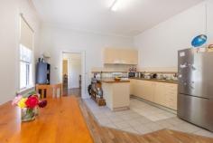 1055 Mate St North Albury NSW 2640 $645,000 Discover a fantastic investment opportunity at **1055 Mate St, North Albury** - a versatile block featuring two separate units, with a combined price guide of just $645,000. The front unit is a spacious 3-bedroom house, complete with a modern kitchen boasting a gas stove, a cozy meals area, a formal lounge, and a delightful sunroom. This home offers year-round comfort with heating and air-conditioning, and it includes a main bathroom, combined laundry, a covered pergola for outdoor enjoyment, and a carport. At the rear, you'll find a well-constructed 2-bedroom townhouse, courtesy of renowned local builder, Hotondo Homes. This modern townhouse features built-in robes, a sleek main bathroom, a contemporary kitchen with stunning tiled flooring in the family meals area, and a secure lockup garage. Currently, the property generates an attractive rental yield, with the house renting at $320.00 per week and the townhouse at $330.00 per week.