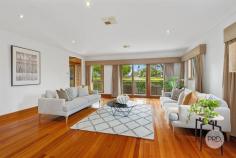 22A Neville Street Oatley NSW 2223 $2,600,000 Discover the allure of this sophisticated residence, perfectly positioned in a highly coveted street, just moments away from schools, parks, the train station, and the vibrant Oatley Village. Embraced by a captivating exterior, this refined brick home offers a spacious retreat for families, with generous proportions and a secluded leafy backdrop creating an inviting haven. Numerous living spaces provide a spectrum of entertainment possibilities. Host memorable dinner parties in the formal lounge and dining area which seamlessly flow into the open-plan family room from the well-appointed kitchen. Enjoy elevated leafy vistas and direct access to the outdoor dining area, creating a cozy and relaxed space for casual living and dining. The four generously sized bedrooms, all with built-in robes, cater to comfort. The master bedroom presents the epitome of luxury. Revel in a spacious walk-in robe, an elegant ensuite, and direct access to a private, north-facing courtyard. An additional study adds practicality for those who work from home. The gourmet kitchen seamlessly combines size, elegance, and functionality, featuring high-quality appliances, a beautiful stone countertop, gas cooking, and a practical island with seating. Both bathrooms showcase sleek, premium finishes, and an extra powder room adds convenience for guests. On the lower level, discover an additional lounge room with direct backyard access, offering versatility and an excellent extra space for growing families. While outdoors you can indulge in the expansive entertainer's decks, a flat grassed yard, stunning timber floors, and an oversized double garage with internal access. This home, with its sought-after features, is the fresh start you've been eagerly anticipating. Key Features: - 4 generously sized bedrooms with built-in robes, master with walk-in robe & ensuite - Multiple layout options for harmonious living for the growing family - Stunning elevated district views with a private leafy outlook - Two expansive entertainer decks & a flat grassed yard - Ultra-convenient location within walking distance to shops, schools, parks & transport