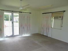 11 Mayflower St Innisfail Estate QLD 4860 $290,000 This cozy three-bedroom block home is perfect for investment or as a comfortable family residence. Two of the bedrooms have built-in wardrobes, and the living area is an open-plan design that includes the kitchen and dining room. The bathroom is spacious and beautifully tiled, and all rooms have air conditioning. The home is ideally situated in a serene neighborhood and is conveniently located near hospitals, shops, and schools. It sits on an 809 square metre block of land and is built with quality materials. The home also comes with some furniture.
