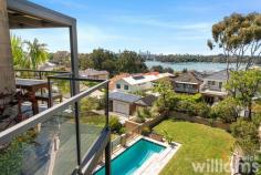 41 Broughton St Drummoyne NSW 2047 Beyond the elegant and leafy exterior of this architect designed residence is a stunning family home with breathtaking city skyline and water views. Nestled on a wide and peaceful street in Drummoyne, this duplex property unfolds over three expansive levels, providing an incredibly versatile layout with multiple living areas and four generously proportioned bedrooms. Featuring thoughtful, high quality design elements such as a C-Bus lighting system, custom cabinetry, and three car auto entry garage, the home exudes style and exacting standards throughout. Transition effortlessly to the outdoors via the upper-level balconies that soak up the incredible vista or enjoy relaxed social occasions in the expansive garden with deep in-ground swimming pool. Ideally located, only 350m to the Bay Run, 450m to Lyons Rd, 650m to St Marks primary school. • Outstanding four-bedroom family home in a prized Drummoyne address • Gorgeous uninterrupted water and city views (including the Harbour Bridge); dazzling both day and night • Sun-drenched upper-level featuring large living space, entertainer's balcony, views • Modern gas kitchen with integrated appliances, stone benchtops, ample storage • Huge master suite including balcony, extensive views, modern ensuite, walk-in robe • Three spacious bedrooms on 2nd level, all with built in storage. Guest bathroom • Expansive lower-level includes living space, workshop, storage space, and laundry • Flow through to landscaped garden with level lawn and deep, in-ground pool • Rear laneway access to triple auto lock-up garage. Private access to property