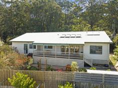 22 Landy Rd Foster VIC 3960 $720,000 Only a few minutes walk from the centre of town, this unique property enjoys the best of both worlds. Set on approximately 1051m2 of gardens with views out over the treed surrounds to the distant ranges with a wonderful connection to nature, with the convenience of all of the town amenities close by. Superbly maintained both inside and out with large rooms, high ceilings and large areas of glazing framing the delightful outlook. Open plan living room features polished timber flooring, wood heater and RC/AC. A spacious sunroom adjoins with a soaring ceiling, feature skylight and bi-fold glass doors leading out to a large covered entertaining deck, making this a flexible space that can be used to naturally heat and cool the home. The kitchen is a delight with country style cabinetry, feature recycled Oregon timber benchtops and the star of the show, a 'Falcon' 900mm dual fuel range with gas hob and double oven. There are three large fitted bedrooms, the master complete with a light filled ensuite. A centrally located main bathroom services the balance of the home and there is also a laundry / utility room with further storage. Outside the delights continue with established native plantings, winding paths to secluded spots to sit and reflect, raised vegetable beds, fruit trees, hot house, wood shed and lockup garage / workshop with direct access. Set on a quiet no through road with the bush reserve adjoining, this is a must see for anyone seeking peace and quiet.