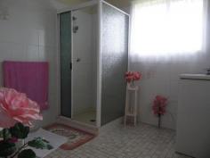 11 Mayflower St Innisfail Estate QLD 4860 $290,000 This cozy three-bedroom block home is perfect for investment or as a comfortable family residence. Two of the bedrooms have built-in wardrobes, and the living area is an open-plan design that includes the kitchen and dining room. The bathroom is spacious and beautifully tiled, and all rooms have air conditioning. The home is ideally situated in a serene neighborhood and is conveniently located near hospitals, shops, and schools. It sits on an 809 square metre block of land and is built with quality materials. The home also comes with some furniture.